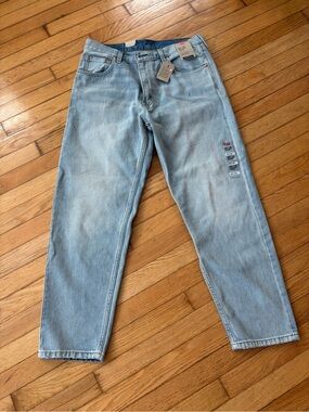 Levi's 550 '92 Relaxed Taper, Light Stonewash Jeans with pen mark paint details